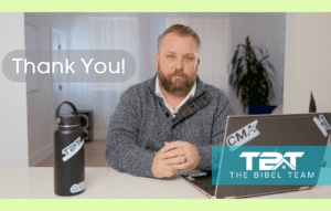 Eric Bibel sitting at a desk with a laptop and water bottle, the Bibel Team logo, and the words, thank you